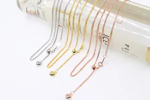 Detail of adjustable S925 silver wheat chains in silver, gold and rose gold finishes
