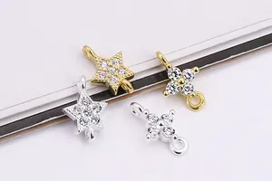 Macro view of S925 silver star and cross pendants with micro-set zircon and double rings