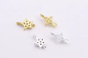 Macro detail of S925 sterling silver star charms with cubic zirconia for DIY jewelry