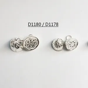 Macro shot of S925 sterling silver hollow lotus seed pod pendants with 925 hallmarks