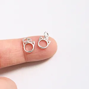 Pair of S925 sterling silver cat ear charms for DIY bracelets on a fingertip