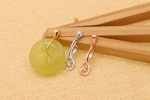 Macro detail of S925 sterling silver cloud pendant clasp for jade donuts in three colors