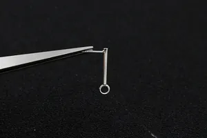 Macro view of S925 sterling silver rectangular stud earrings DIY components with smooth finish