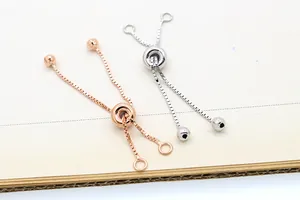 Détail de chaînes d'extension coulissantes en argent S925 rose et argent pour bijoux