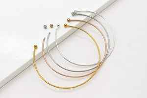 Macro shot of S925 silver bangles showing screw ends for DIY jewelry bead threading