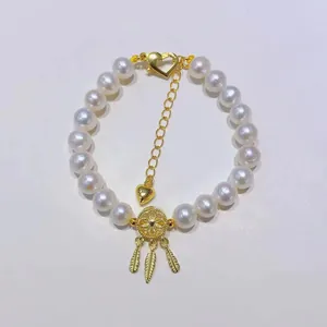 Elegante bracciale di perle in argento S925 con chiusura a cuore e ciondolo acchiappasogni