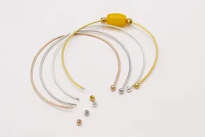 Macro detail of S925 silver DIY screw bracelets showing threading and color variants