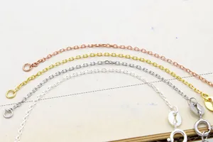 Detail showing 925 sterling silver link chains in gold, rose gold and silver finishes