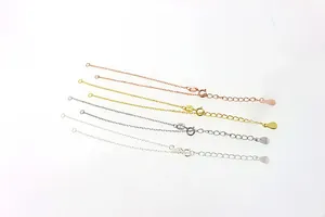 Close-up of S925 sterling silver chain extenders in rose gold, gold, silver, and platinum