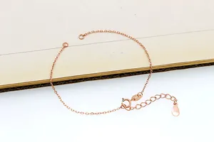 Detail of rose gold S925 sterling silver cable chain with adjustable extension and drop tag