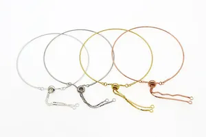 Close-up of four-color adjustable S925 sterling silver slider bracelets for DIY beads