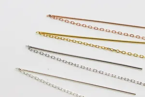 Macro view of S925 sterling silver wave ear wires in gold, rose gold and silver finishes