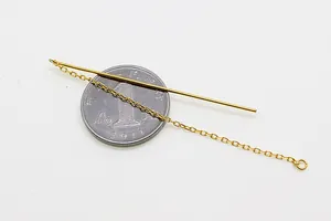Close-up of gold S925 sterling silver ear threader with chain and open loop connector