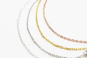 Detail showing S925 sterling silver O-chains in gold, silver, and rose gold finishes