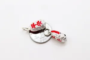 Detail of S925 sterling silver lantern pendant with red Ping'an enamel on small coin