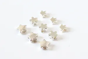 Detail of S925 sterling silver geometric crown star and flower charms for DIY jewelry