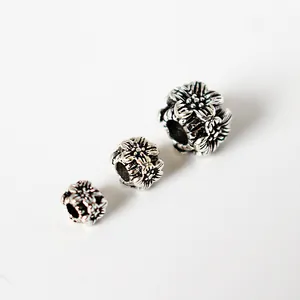 Three pieces of vintage S925 sterling silver floral square spacer beads in various sizes
