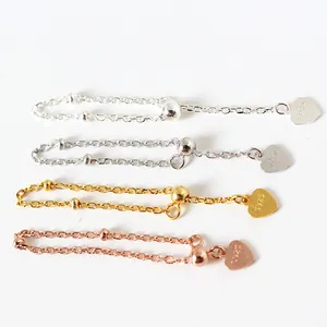 Verstelbare S925 zilveren ringketting met hartjeslabels in vier diverse metaalkleuren