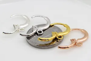Macro view of S925 sterling silver leverback earring hooks in four metallic finishes