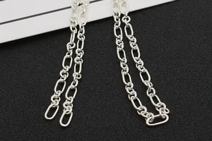 Macro shot of 925 sterling silver Figaro chain links for DIY jewelry making