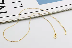 Detailed view of S925 sterling silver gold cable chain with lobster clasp and extender