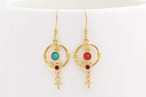 Detail of vintage S925 sterling silver earring hooks with gold leaf and gemstone beads