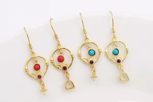 Detailed macro view of S925 sterling silver gold-plated DIY earring findings with gems