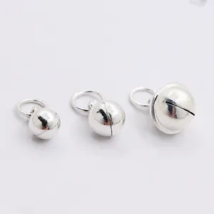 Three-piece set of silver bell pendants in small, medium, and large sizes for DIY jewelry