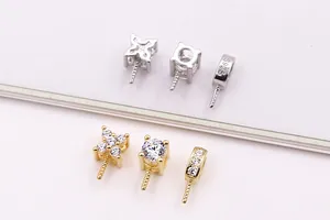 Macro detail of S925 sterling silver jewelry pendant bails with pavé cubic zirconia