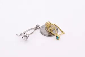 Macro view of S925 silver and gold four-leaf clover pendant bails for DIY jewelry making