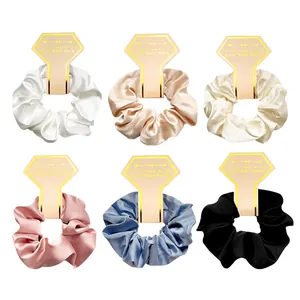 Set of 6 premium satin scrunchies in assorted colors with decorative display cards