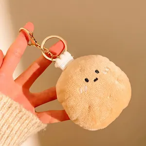 Porte-clés peluche nourriture créatif avec visage souriant tenu en main pour la taille