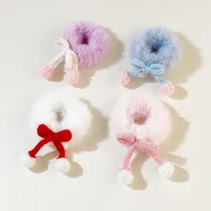 Cute plush hair ties with bows and pom-poms in purple, blue, white, and pink set