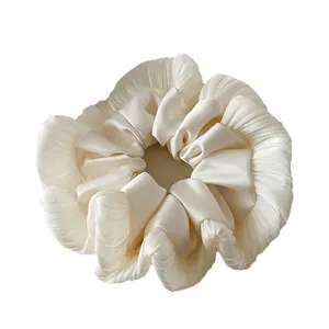 Elegant cream pleated satin scrunchie with lace trim for women's high-end ponytail style