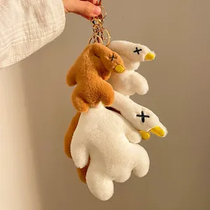 Cute plush duck keychain charms with signature X eyes and golden metal lobster clasps