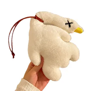 Cute white plush goose keychain with yellow beak and red hanging cord accessory