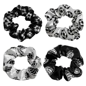 Sports-themed satin scrunchies featuring soccer patterns and volleyball printed motifs