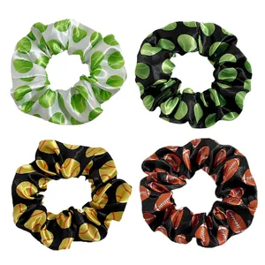 Detail of 4-piece sports scrunchie set with tennis, softball and football satin prints