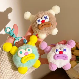 Cute fuzzy monster keychains with funny lips and round eyes for bags and gifts