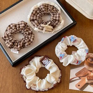 Set of 4 cute plaid lace scrunchies with cartoon bear charms and bow accents