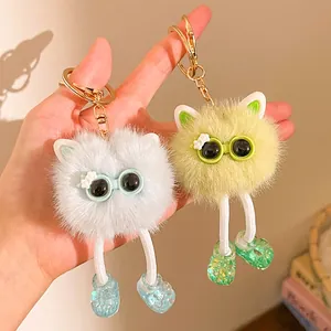 Porte-clés monstres en peluche à longues jambes avec lunettes et chaussures pailletées