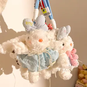 Pendentif lapin en peluche avec robe en dentelle et nœud soleil pour sacs