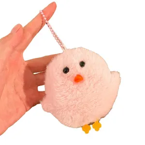 Soft pink plush chick keychain accessory for bags with beaded chain and fluffy texture
