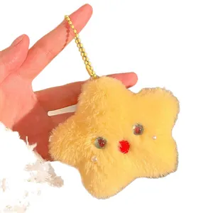 Cute yellow star plush keychain with big eyes and white pearl cheeks on a gold bead chain