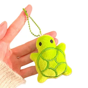 Fluorescent green plush turtle keychain with shell embroidery and green bead chain