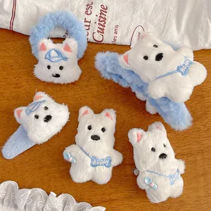 Cute plush dog hair accessory set with scrunchies and clips on a warm wooden background