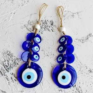 Decorazione da parete Evil Eye fatta a mano con perline di vetro blu e corda di iuta