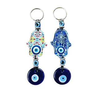 Blue Evil Eye and Hand of Fatima keychains with metal ring for bags or cars decor