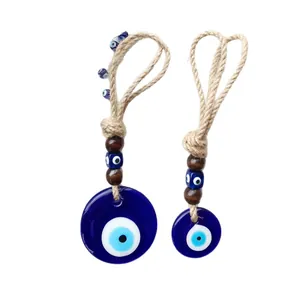 Handmade Turkish Evil Eye wall hanging set with blue glass beads and woven hemp rope
