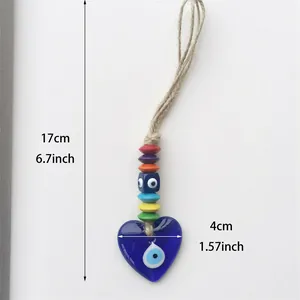 Detail of 17cm evil eye glass heart pendant with colorful beads and natural hemp rope